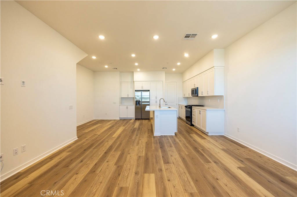 22007 Florence Circle Walnut, CA 91789 - Photo 5 of 30 a view of kitchen with wooden floor