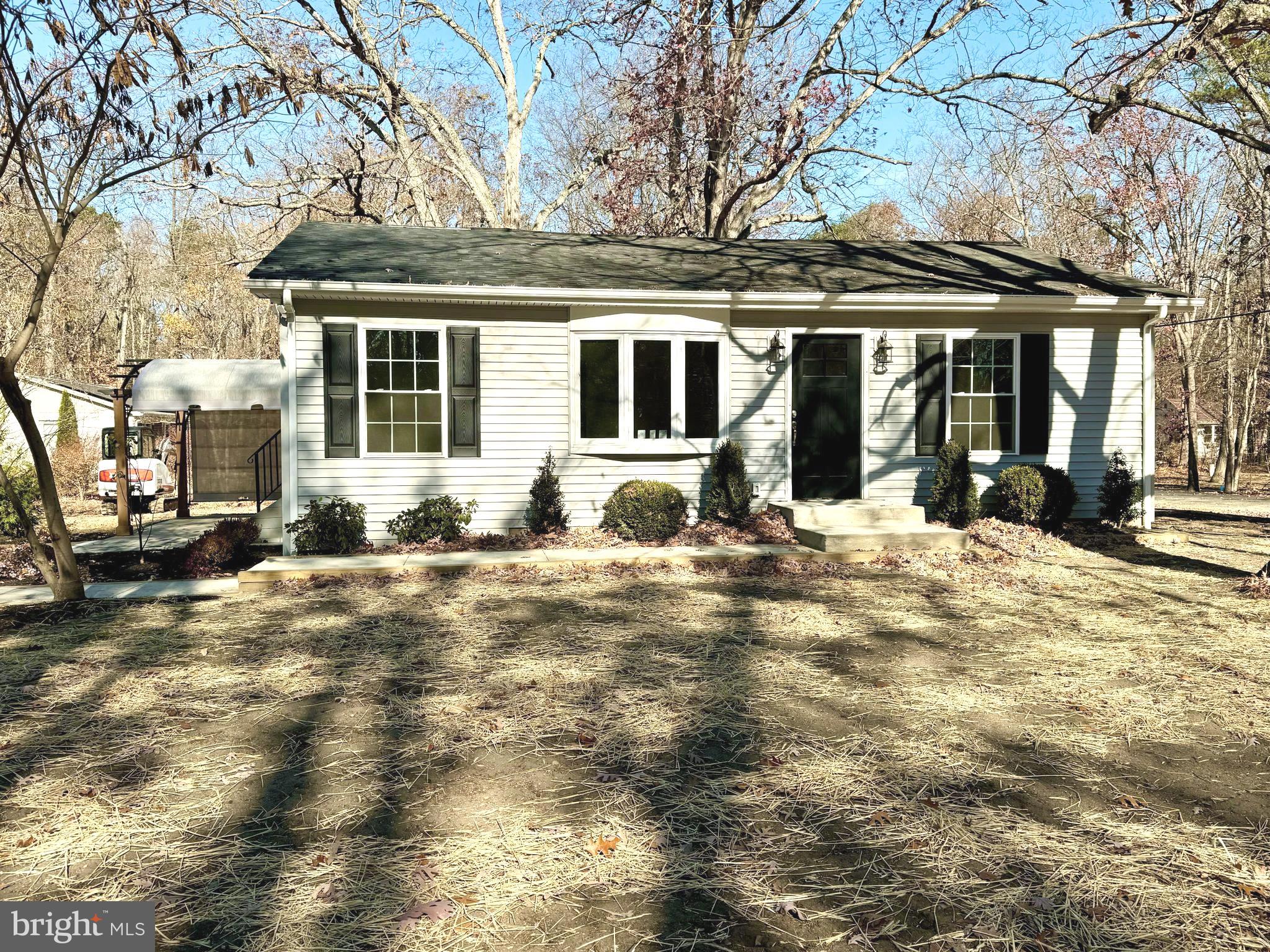25 Cramer Road Tabernacle, NJ 08088 - Photo 2 of 20 a view of a house with a yard covered in snow