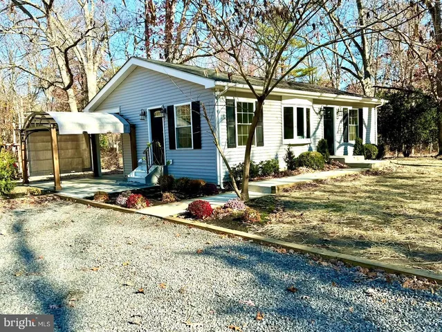 front view of a house with a patio