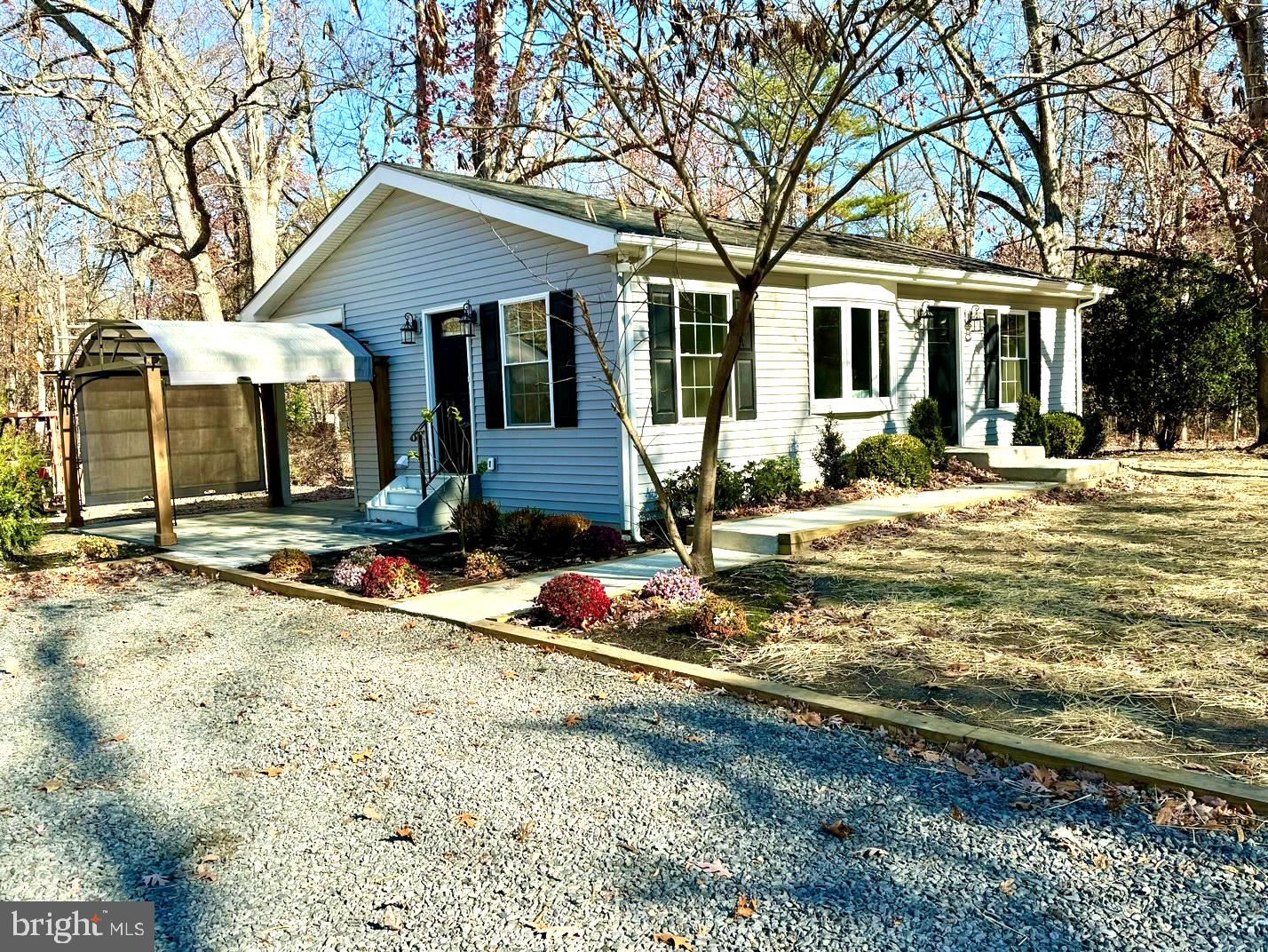 25 Cramer Road Tabernacle, NJ 08088 - Photo 3 of 20 front view of a house with a patio