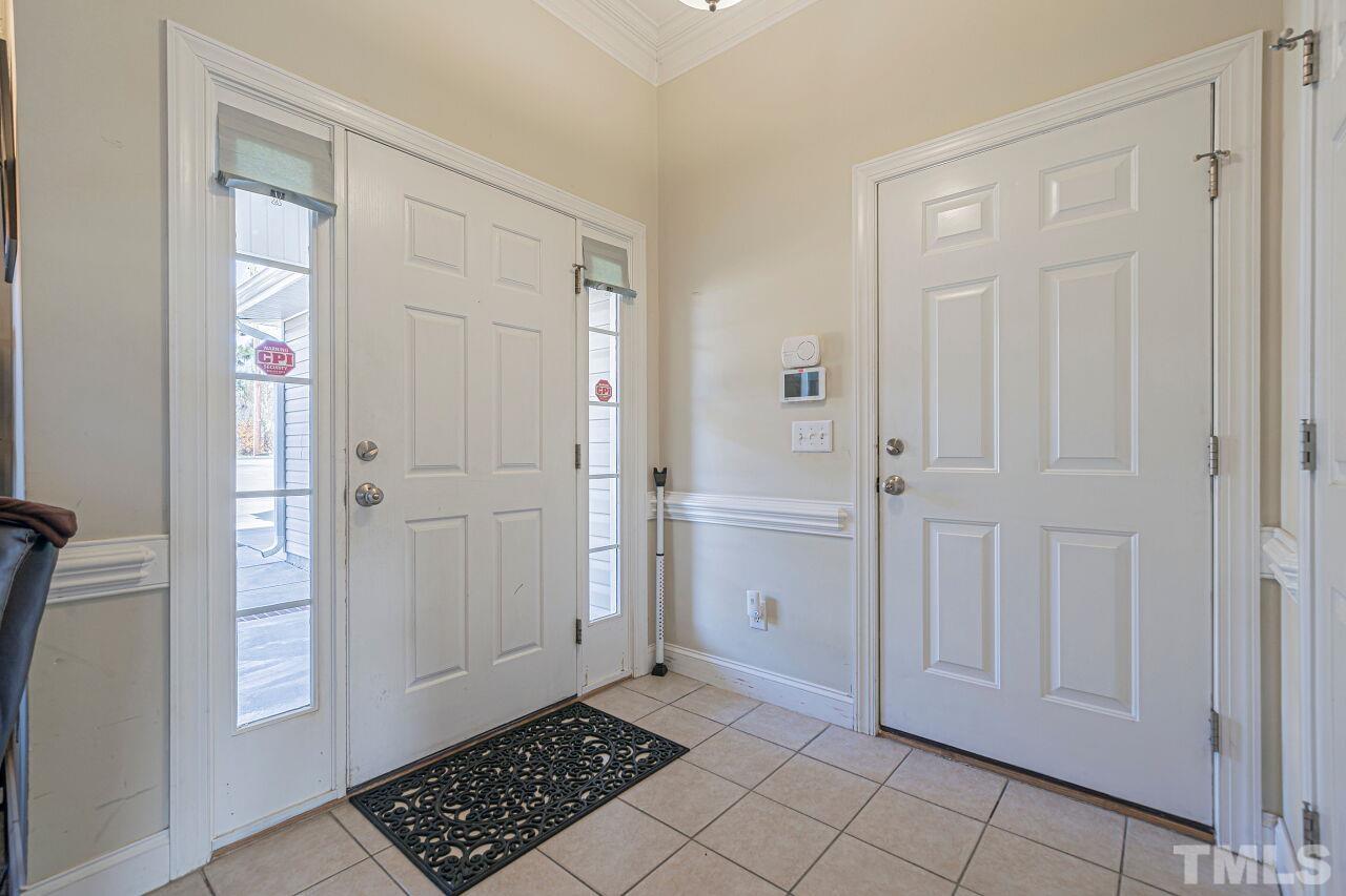 11563 Rockside Road Middlesex, NC 27557 - Photo 2 of 53 an empty room with windows