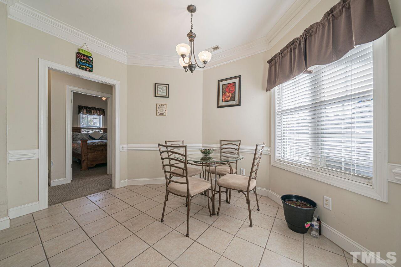 11563 Rockside Road Middlesex, NC 27557 - Photo 15 of 53 a dining room with furniture and window