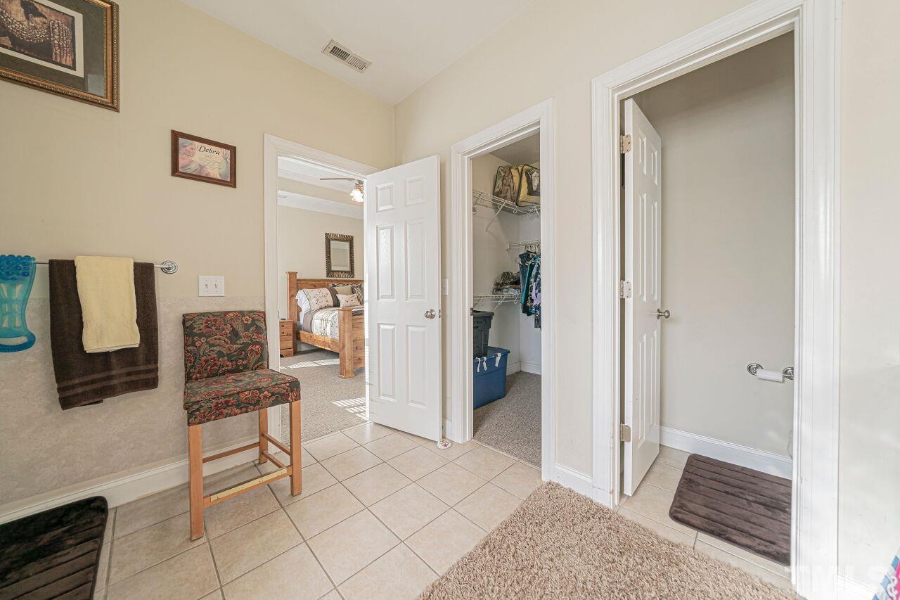 11563 Rockside Road Middlesex, NC 27557 - Photo 36 of 53 a living room with furniture and a rug