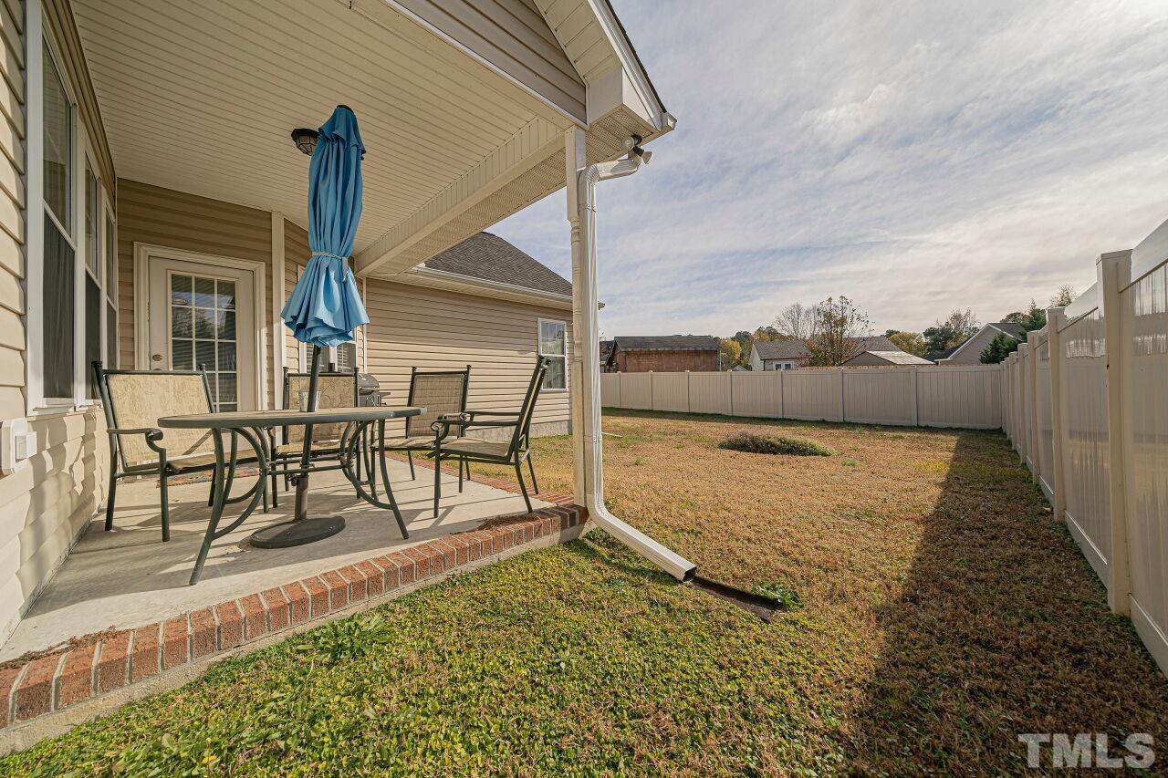 11563 Rockside Road Middlesex, NC 27557 - Photo 49 of 53 a view of a terrace with chairs