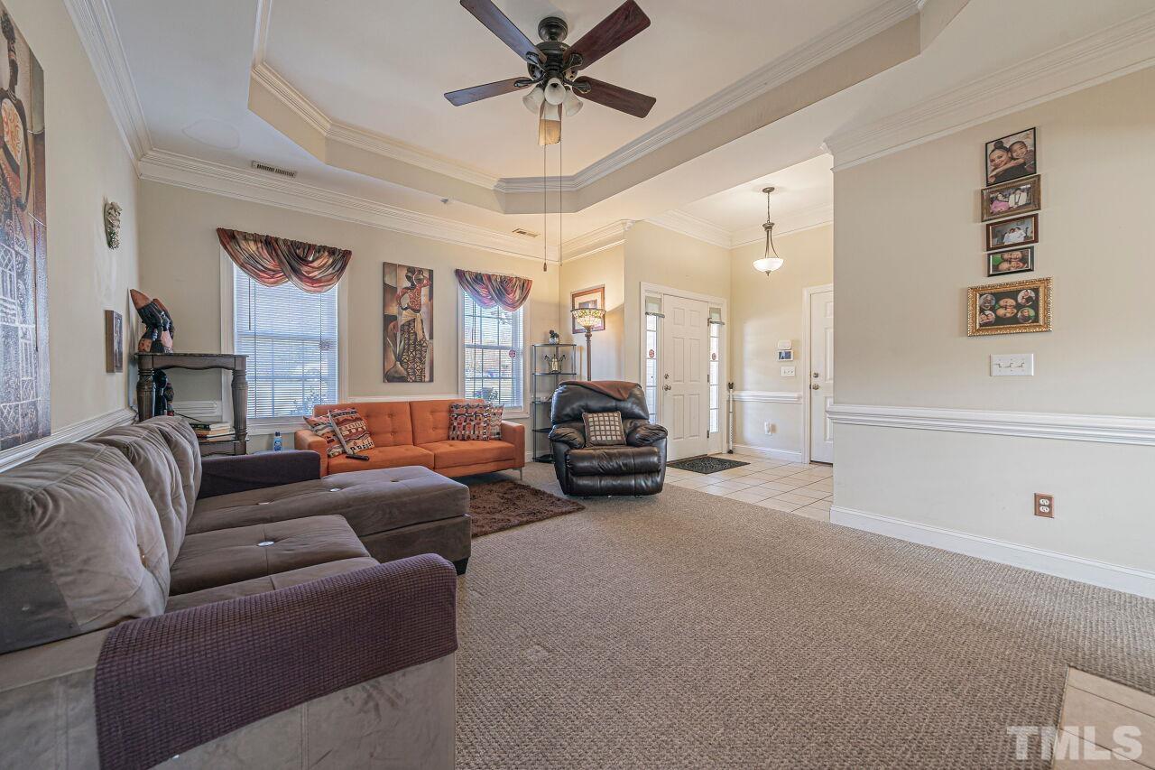 11563 Rockside Road Middlesex, NC 27557 - Photo 6 of 53 a living room with furniture and a large window
