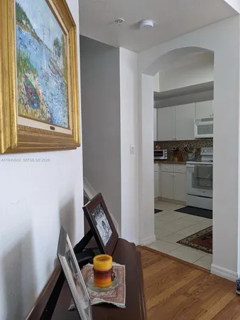 a view of workspace with wooden floor