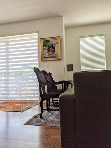 a view of a livingroom with furniture