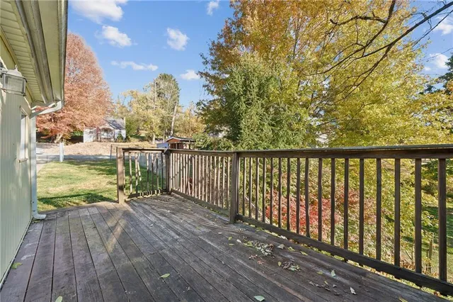 a view of backyard with green space