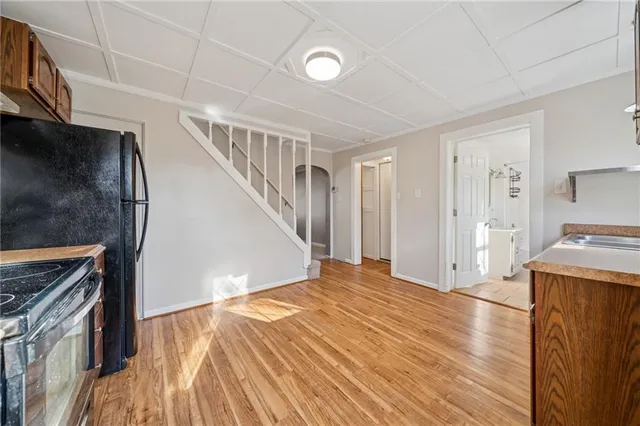 a view of a kitchen with furniture and a kitchen