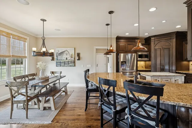 a view of a dining room with furniture