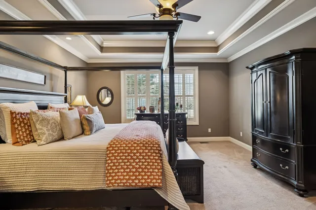 a bedroom with double bed and a window