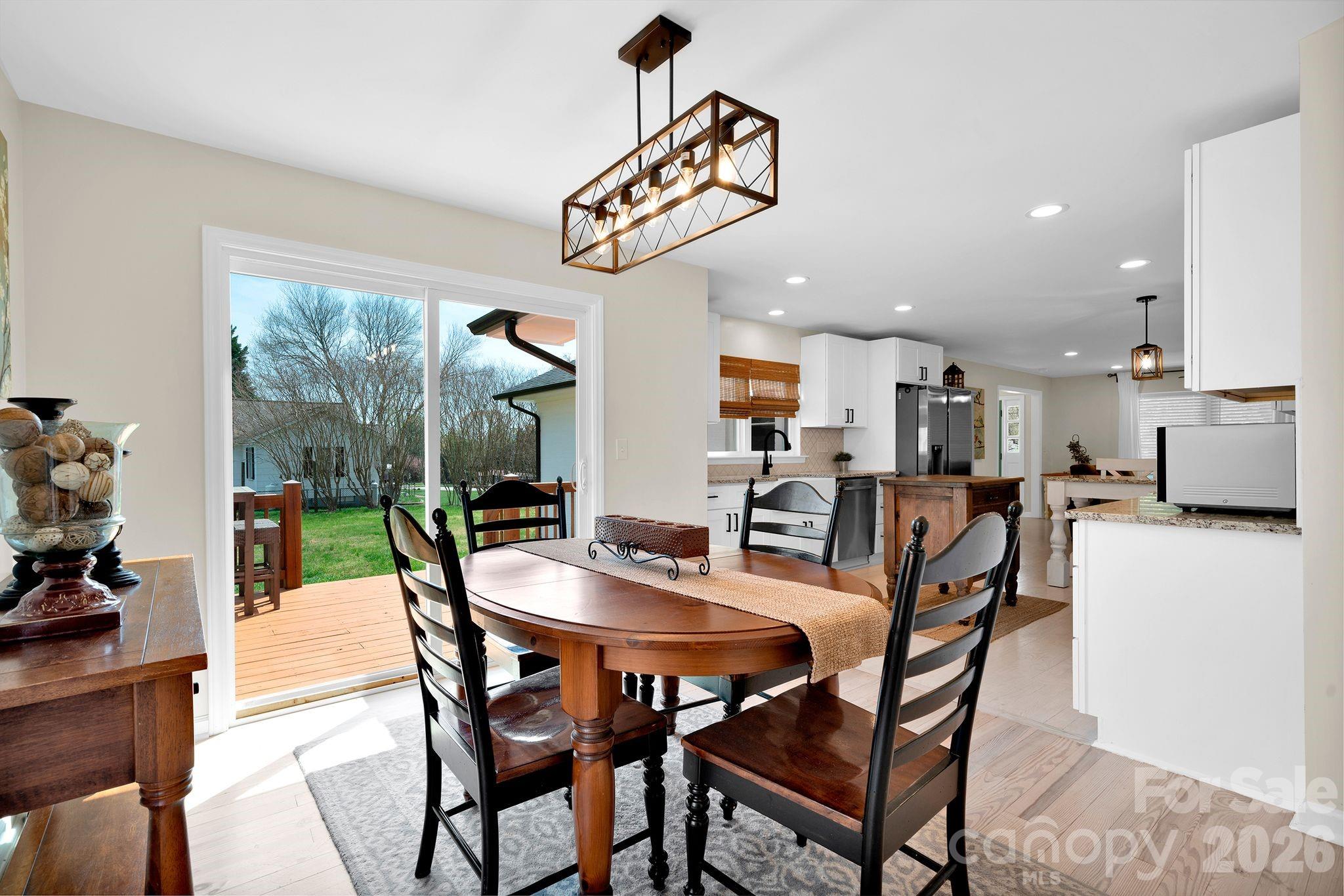 1252 Houston Mill Road Conover, NC 28613 - Photo 16 of 43 a dining room with furniture and window
