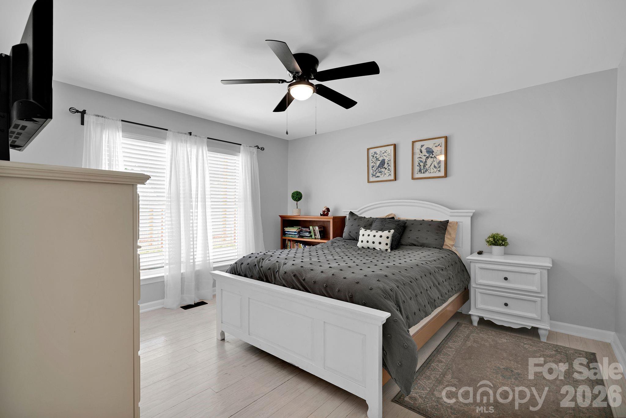 1252 Houston Mill Road Conover, NC 28613 - Photo 27 of 43 a spacious bedroom with a bed and a window