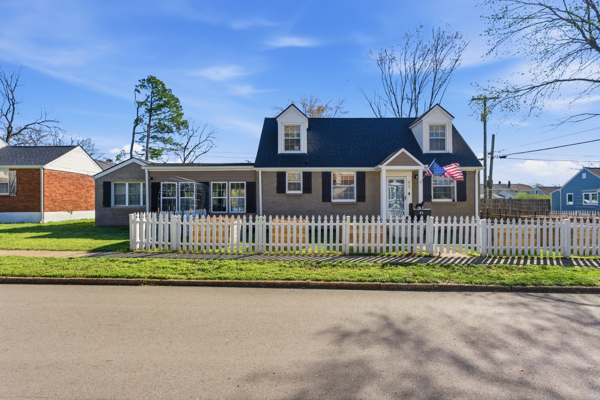 813 Bryan Street Old Hickory, TN 37138 - Photo 2 of 29 a front view of a house with a garden