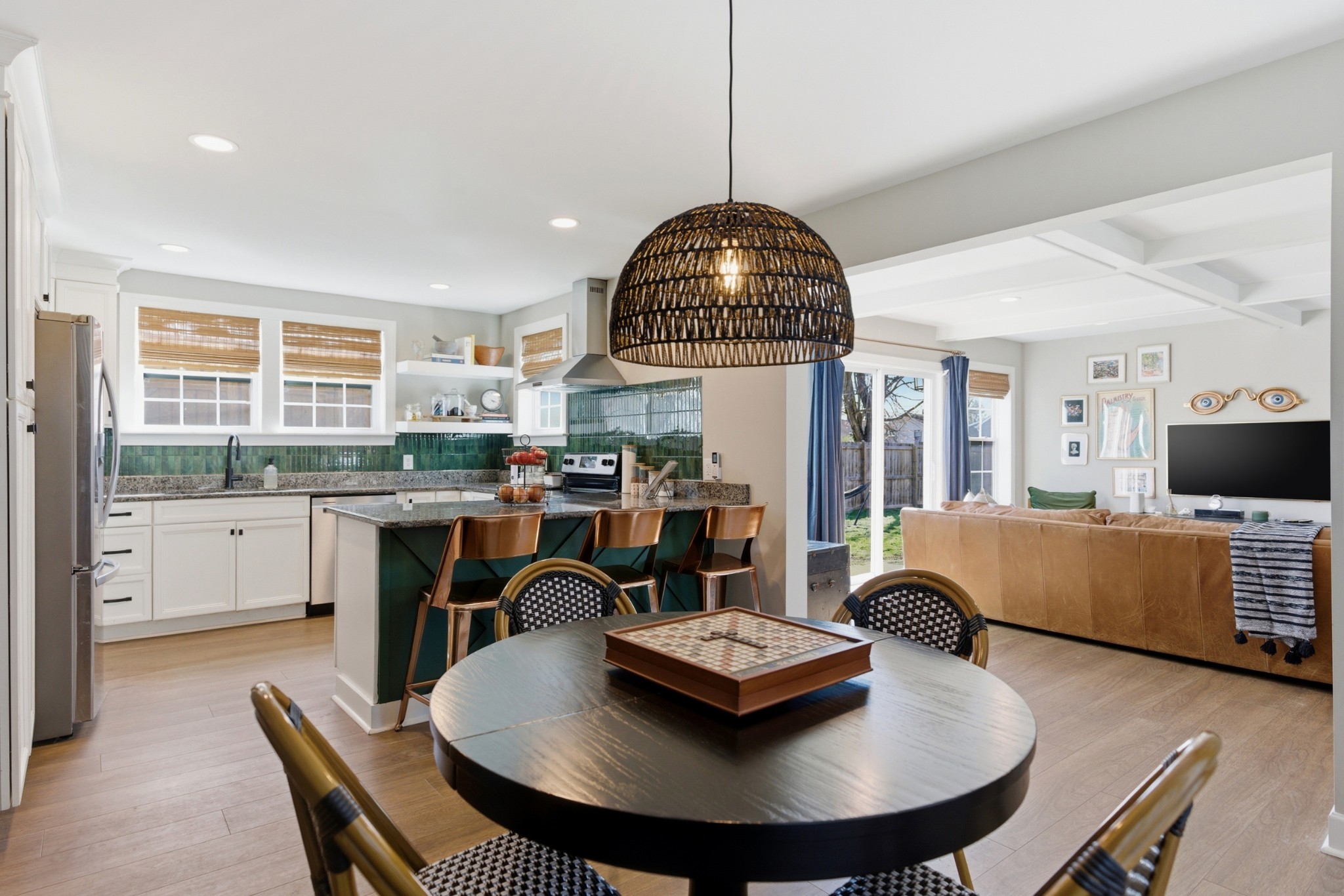 813 Bryan Street Old Hickory, TN 37138 - Photo 8 of 29 a living room with kitchen island furniture and a chandelier