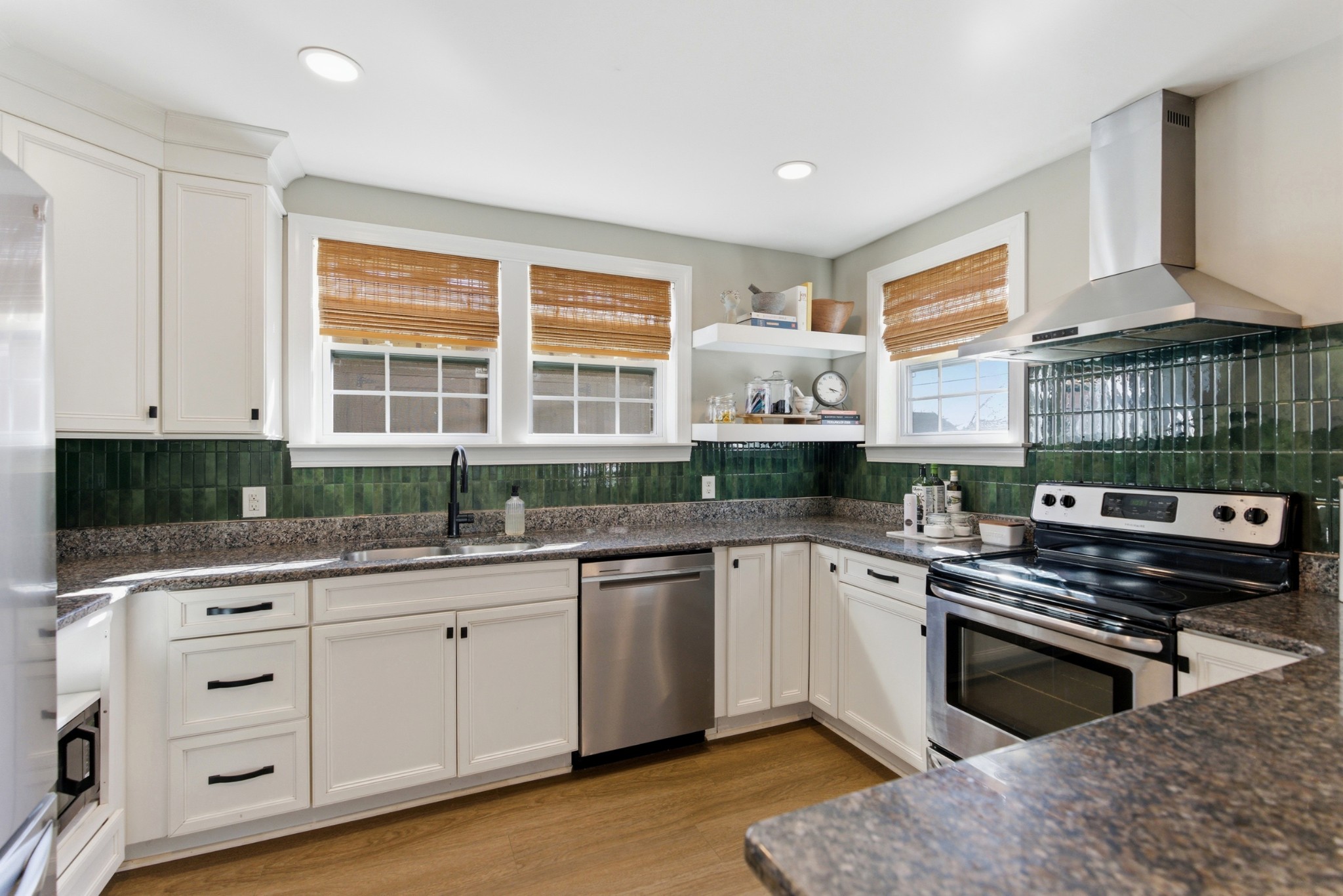 813 Bryan Street Old Hickory, TN 37138 - Photo 10 of 29 a kitchen with granite countertop a sink stove and cabinets