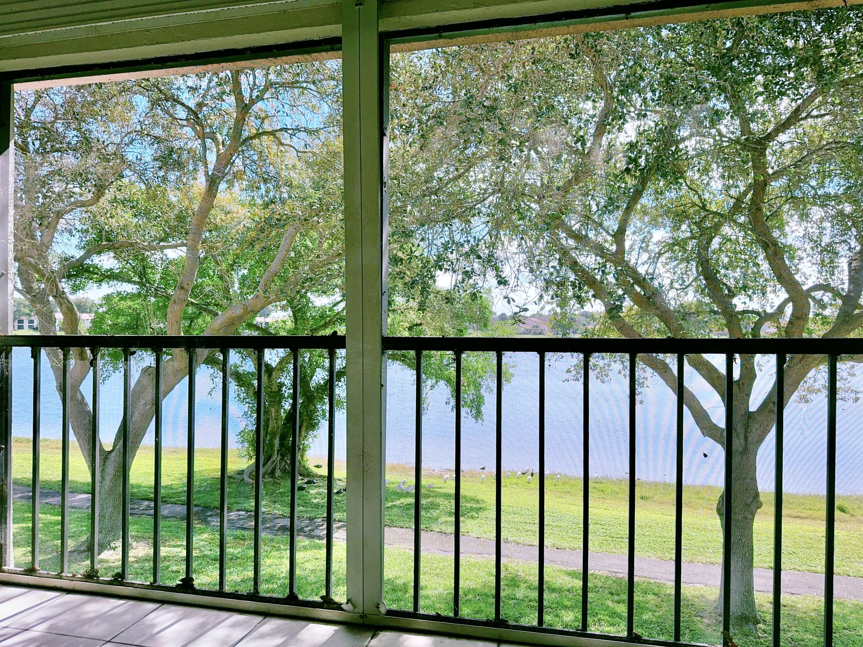 3150 Leewood Terrace, Unit L221 Boca Raton, FL 33431 - Photo 4 of 26 Balcony Lake View
