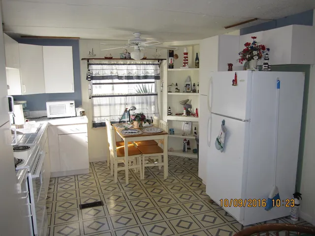 a room with a bed and a window