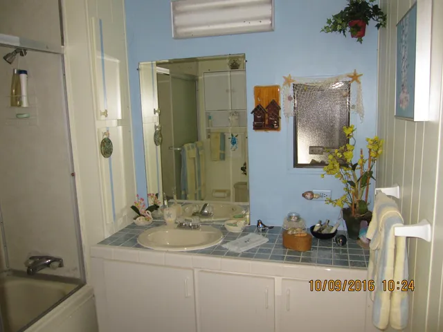a close view of chair and table in a room