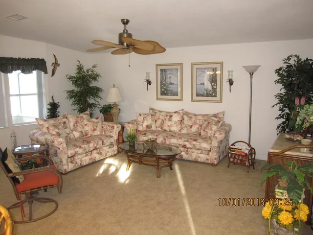 a bedroom with furniture and a couch