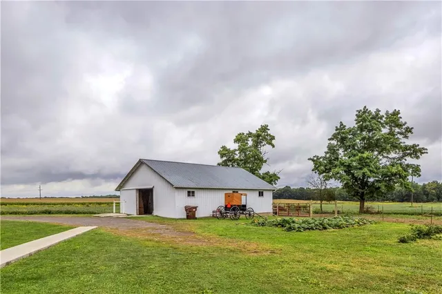 a house view with a garden space