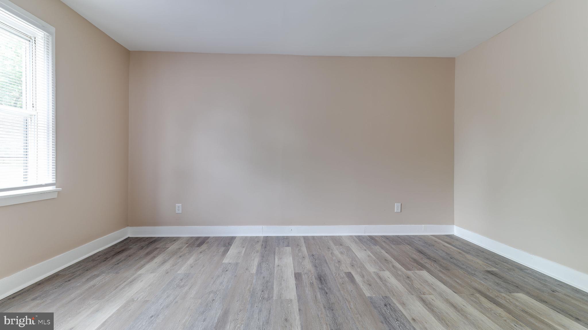 204 West Landing Road Mantua, NJ 08051 - Photo 13 of 20 a view of a room with wooden floor and window