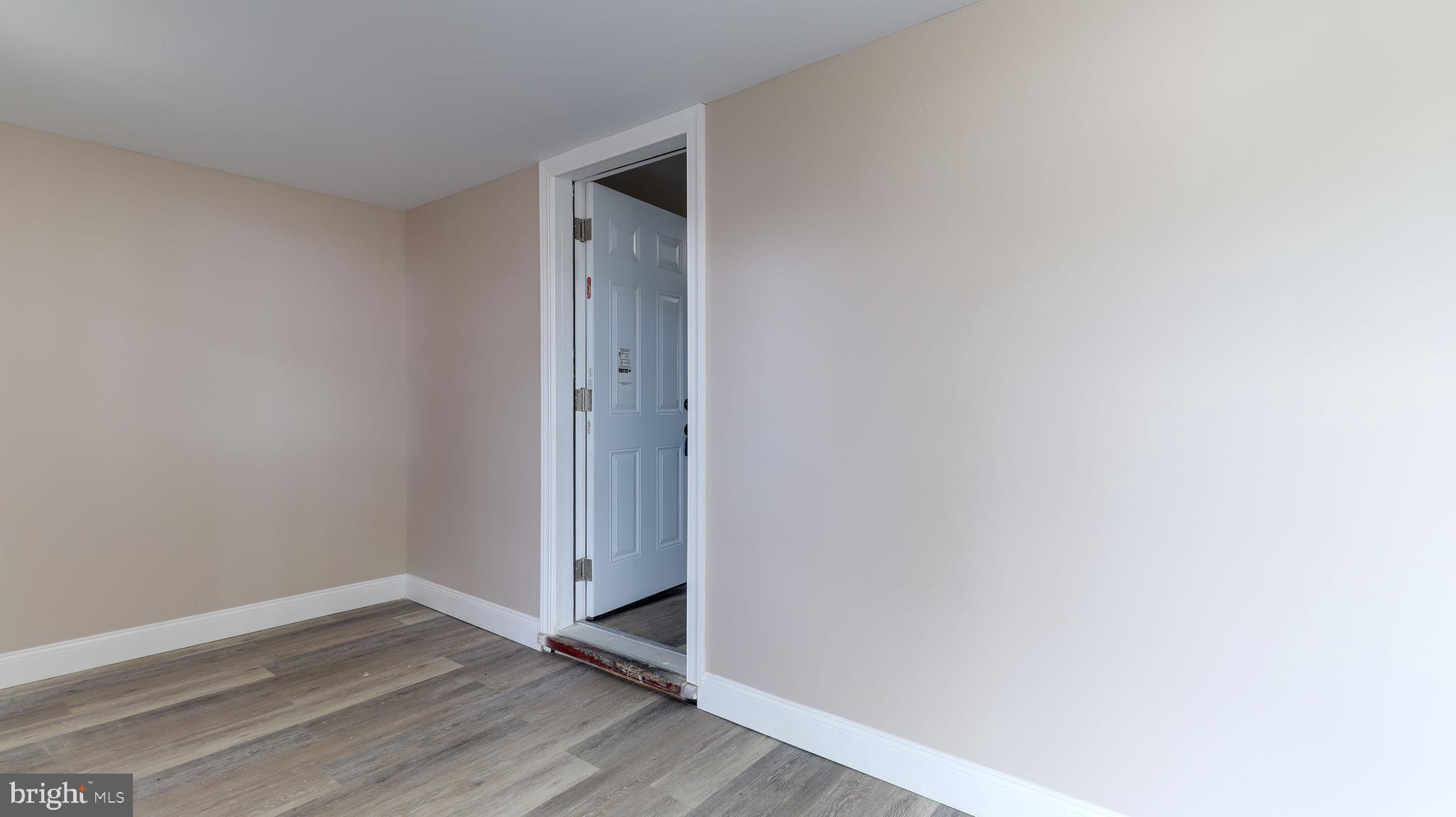 204 West Landing Road Mantua, NJ 08051 - Photo 6 of 20 a view of an empty room with wooden floor