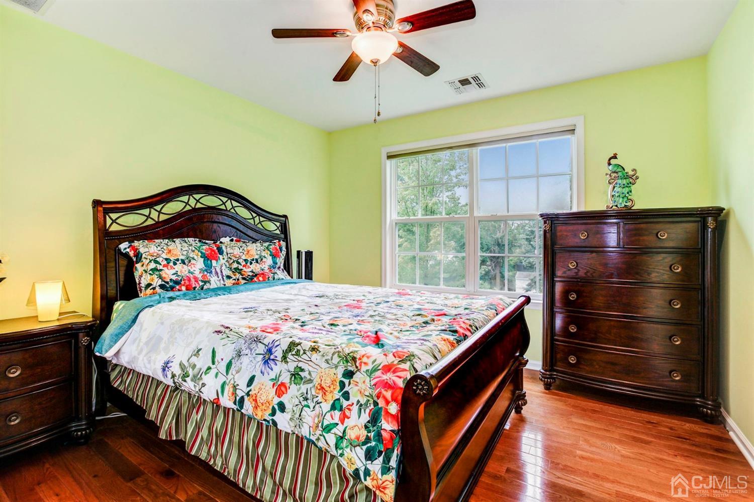 30 Richard Road Edison, NJ 08820 - Photo 22 of 30 a bedroom with a bed and a dresser