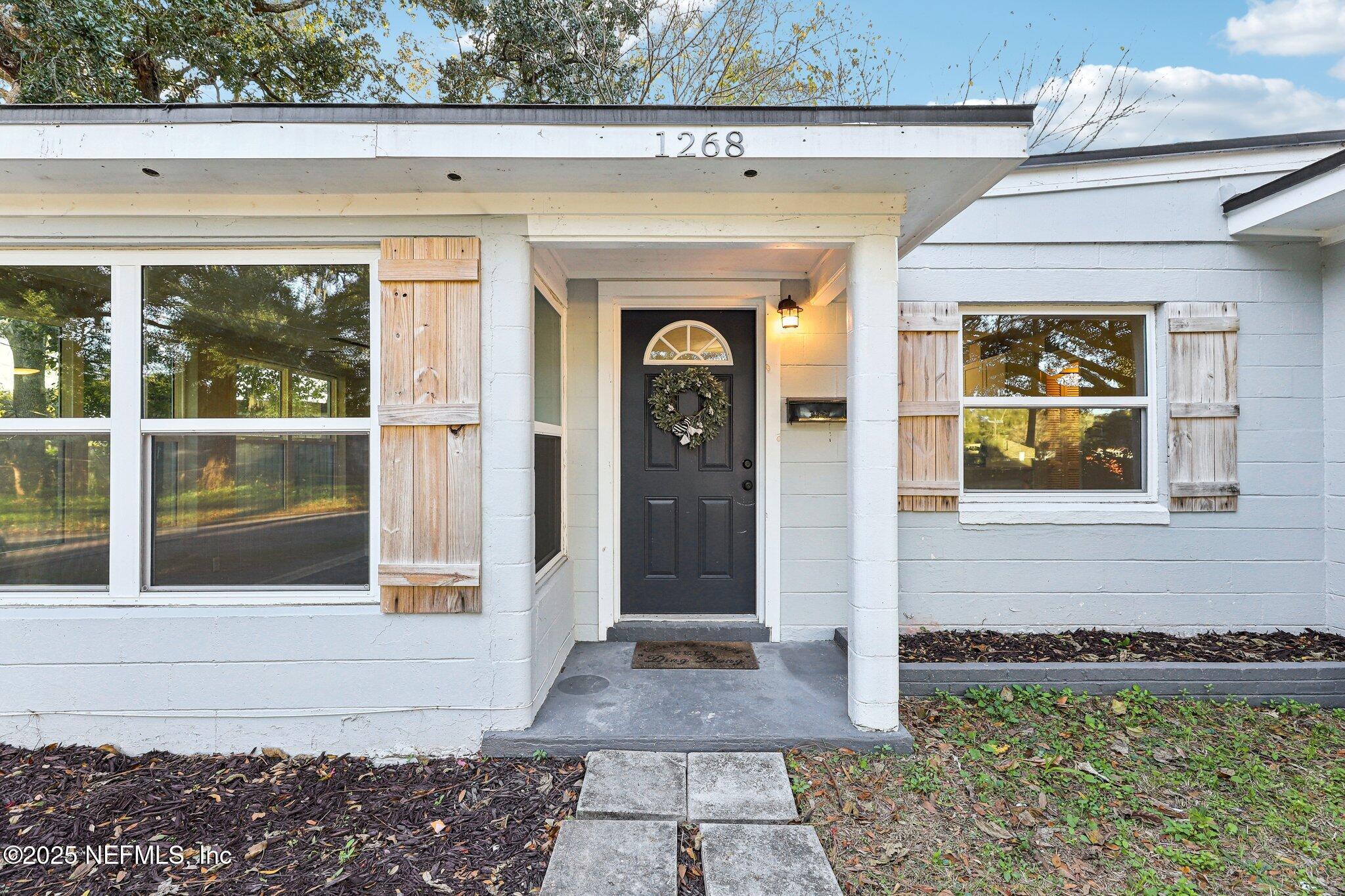 1268 King Arthur Road Jacksonville, FL 32211 - Photo 6 of 35 a front view of a house with shower