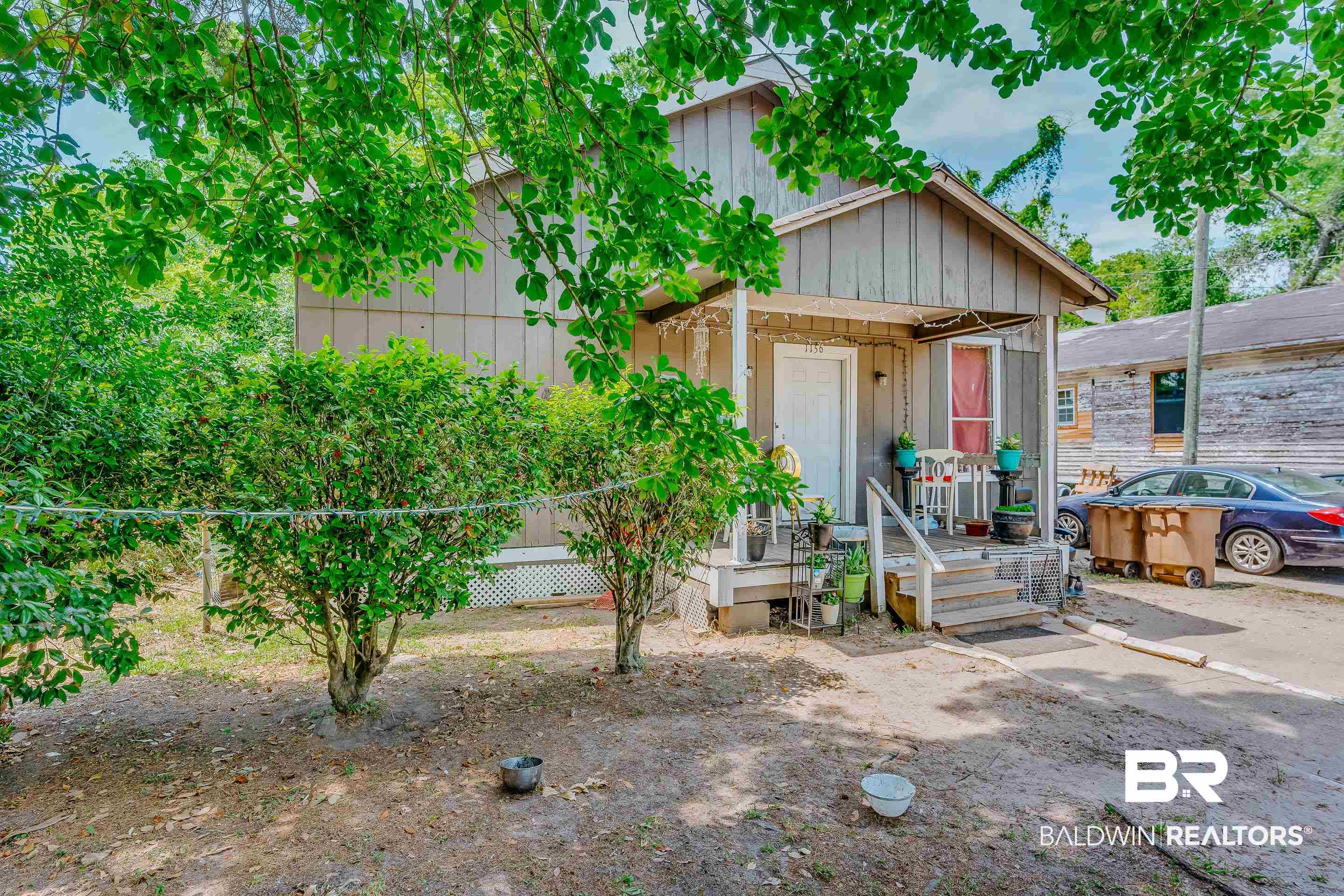 1156 Freeman Street Mobile, AL 36605 - Photo 5 of 22 View of front of house featuring covered porch