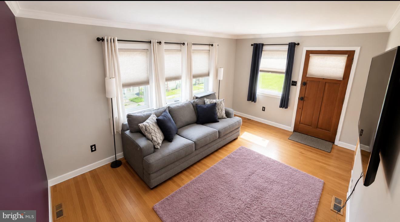 8027 Park Haven Road Dundalk, MD 21222 - Photo 5 of 13 Inviting space with natural light.
Edit with AI