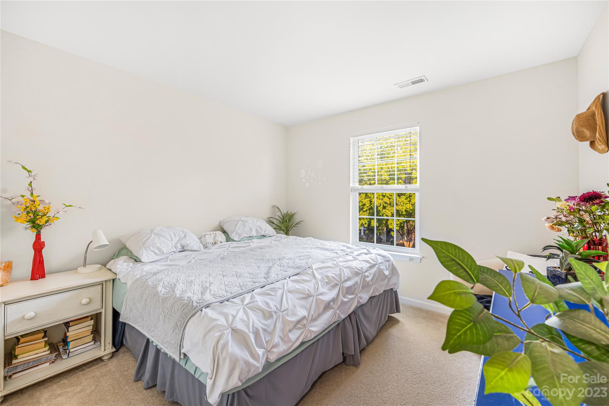 8307 Viewpoint Lane Cornelius, NC 28031 - Photo 15 of 25 a bedroom with a bed and a window