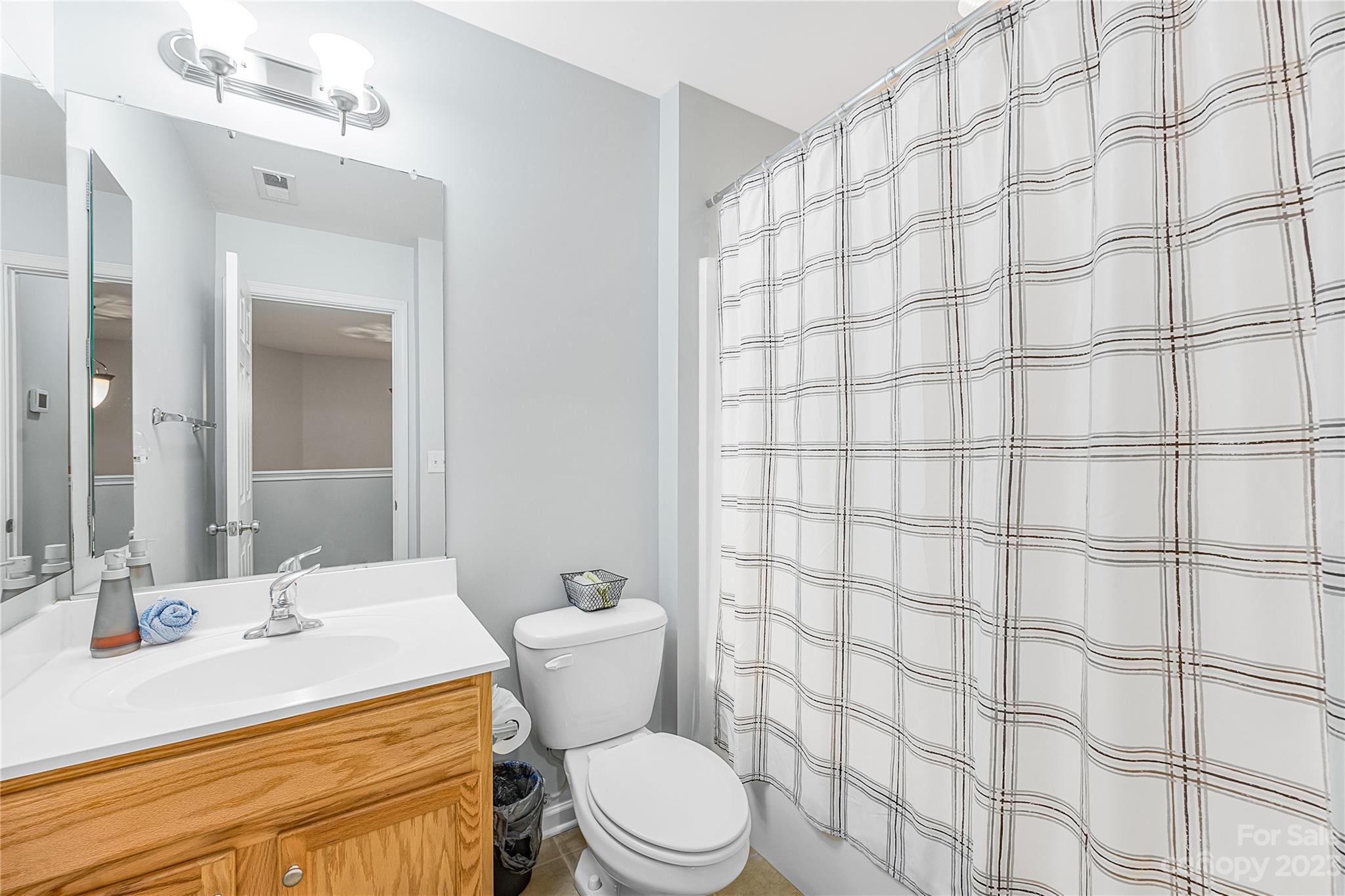 8307 Viewpoint Lane Cornelius, NC 28031 - Photo 17 of 25 a bathroom with a sink toilet and shower