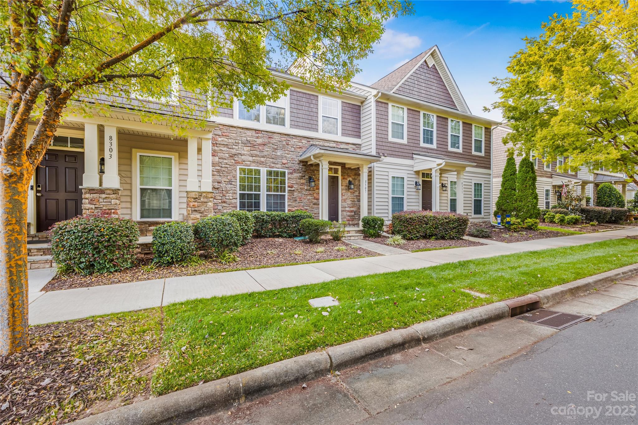 8307 Viewpoint Lane Cornelius, NC 28031 - Photo 21 of 25 a front view of a house with a yard