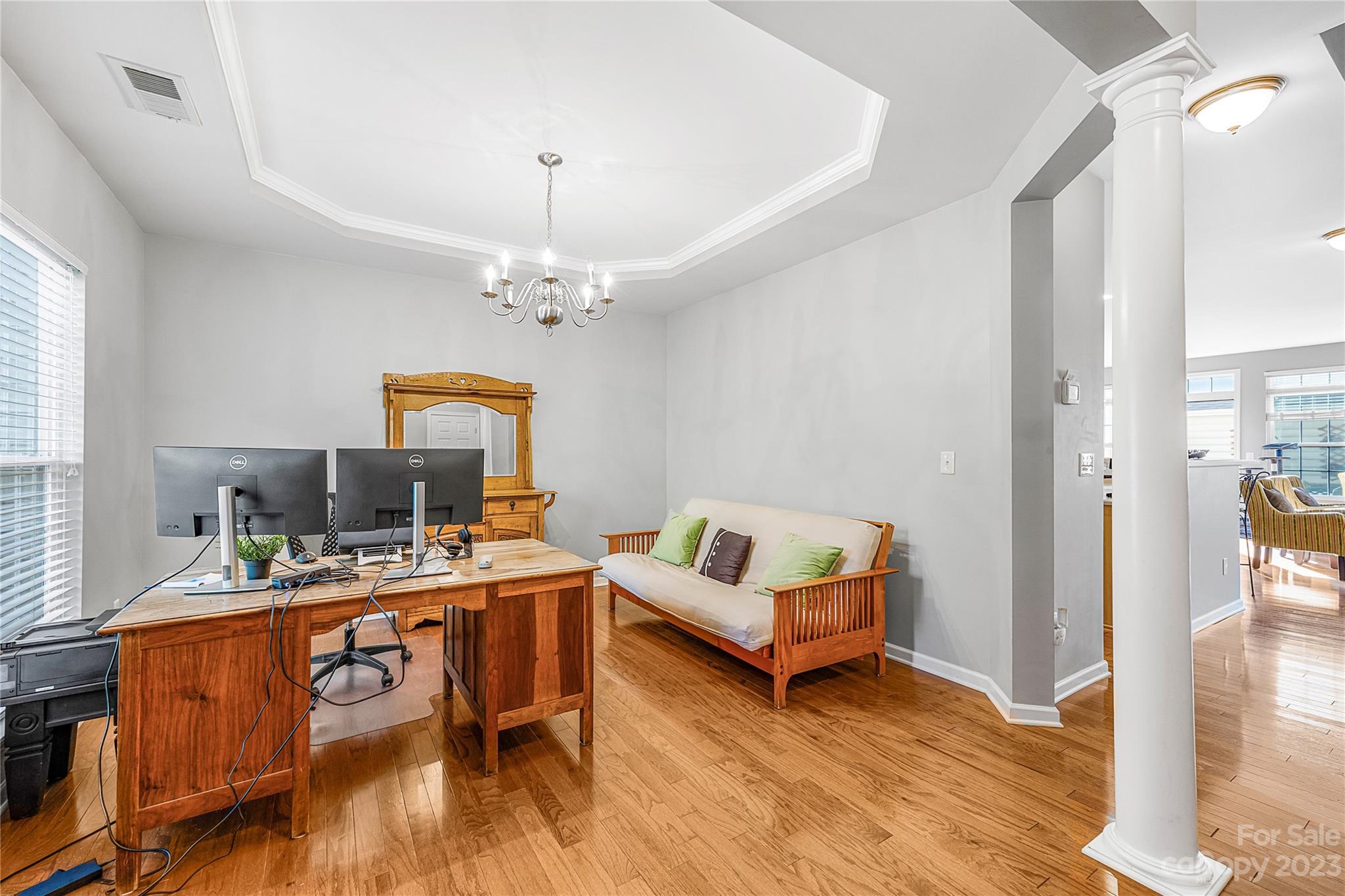 8307 Viewpoint Lane Cornelius, NC 28031 - Photo 3 of 25 a workspace with furniture and wooden floor