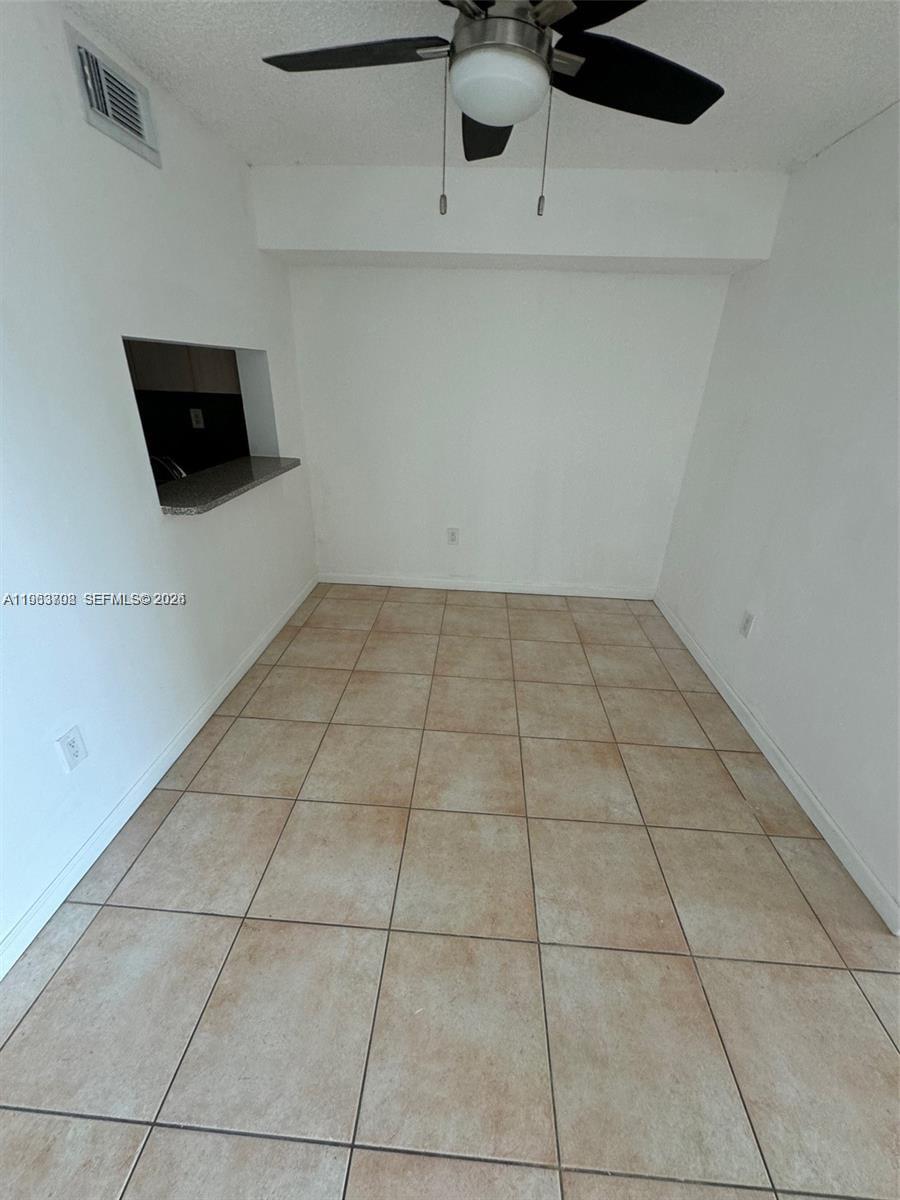 11790 Southwest 18th Street, Unit 3043 Miami, FL 33175 - Photo 11 of 12 a kitchen with a sink
