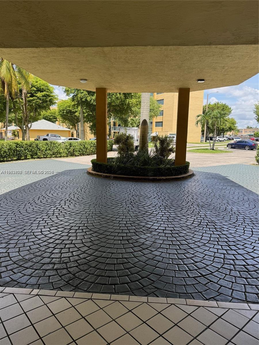 11790 Southwest 18th Street, Unit 3043 Miami, FL 33175 - Photo 2 of 12 a view of a pathway