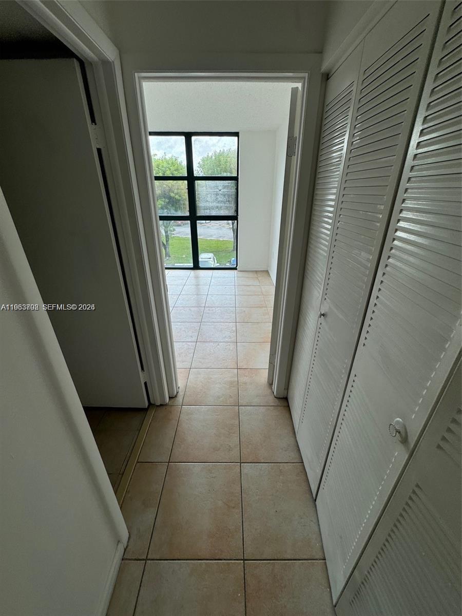 11790 Southwest 18th Street, Unit 3043 Miami, FL 33175 - Photo 10 of 12 a view of a hallway
