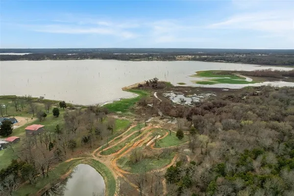 a view of a lake with a city