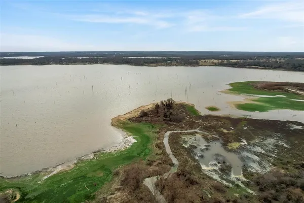 a view of a lake with a city