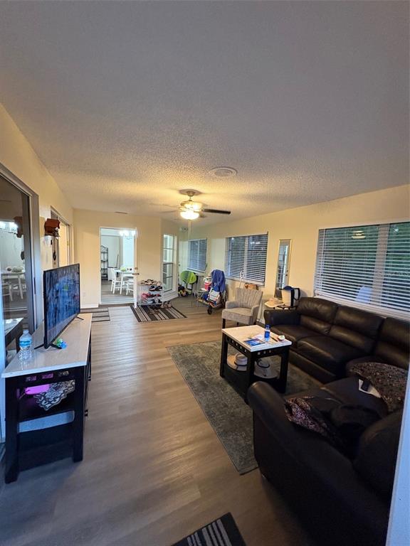 12123 Genoa Street North Port, FL 34287 - Photo 11 of 33 a living room with furniture and a large window