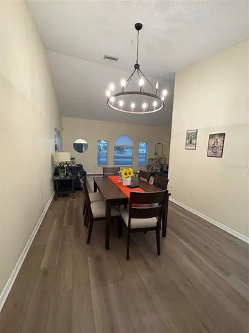 a living room with couch and rug