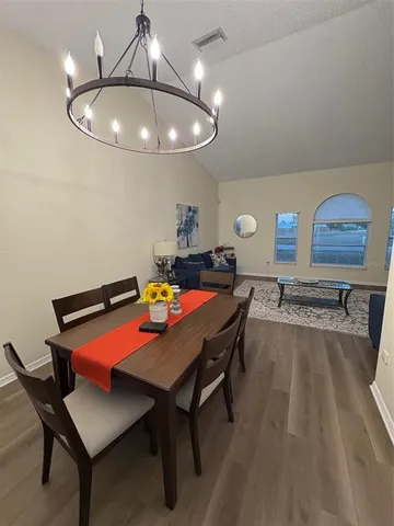 a living room with furniture and a couch