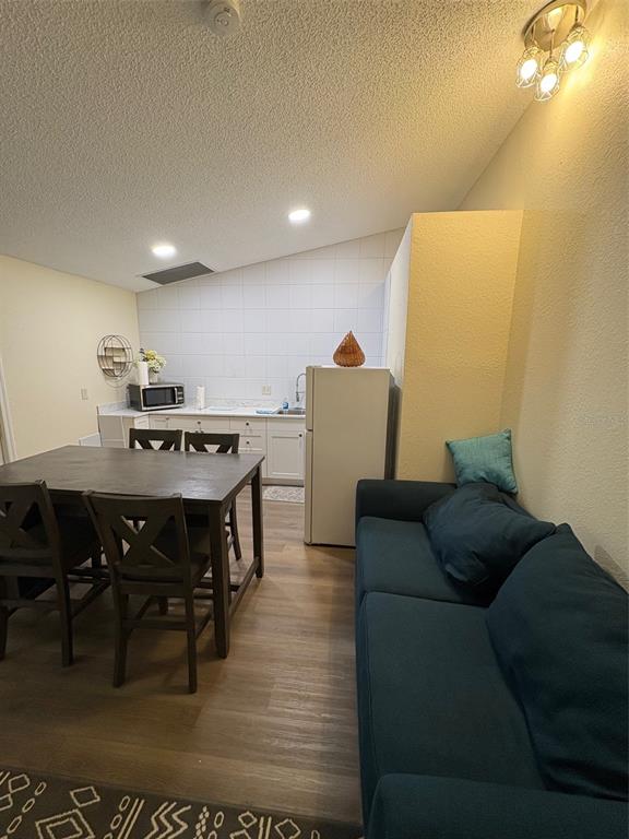 12123 Genoa Street North Port, FL 34287 - Photo 16 of 33 a living room with furniture and a table