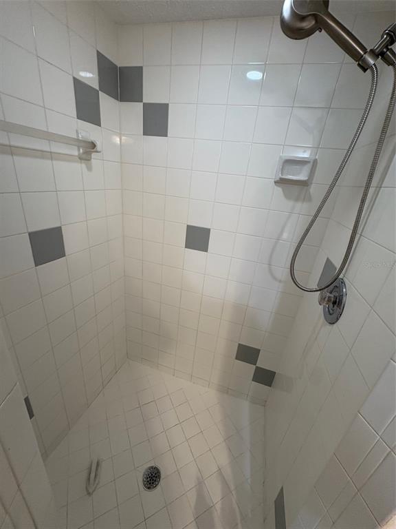 12123 Genoa Street North Port, FL 34287 - Photo 19 of 33 a bathroom with a shower