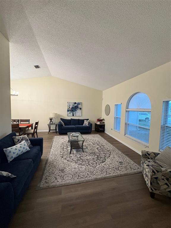 12123 Genoa Street North Port, FL 34287 - Photo 20 of 33 a living room with furniture and a couch