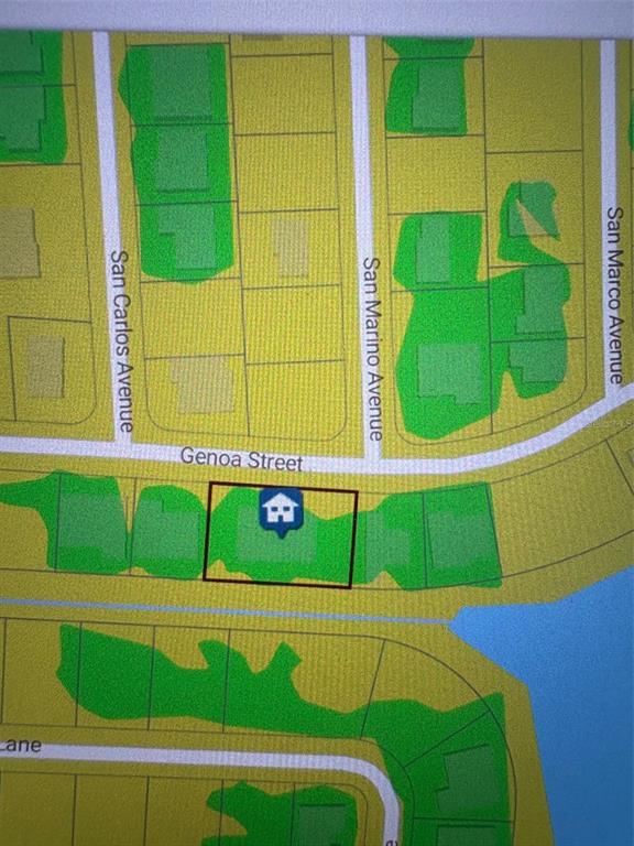 12123 Genoa Street North Port, FL 34287 - Photo 29 of 33 a green and white building