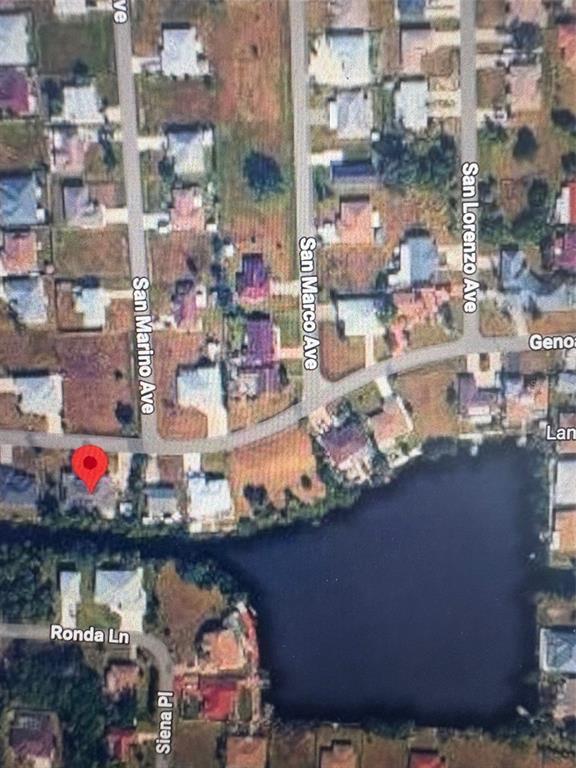 12123 Genoa Street North Port, FL 34287 - Photo 30 of 33 a view of a lake and a city