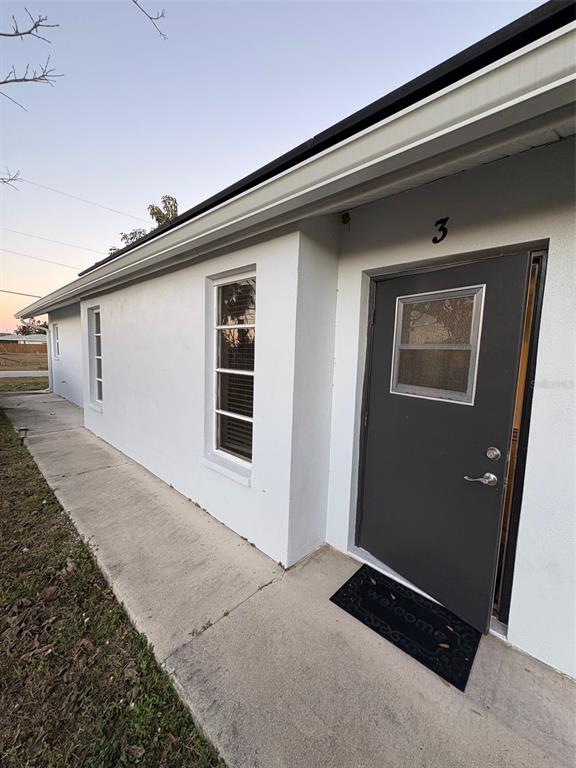 12123 Genoa Street North Port, FL 34287 - Photo 10 of 33 a front view of a house with windows