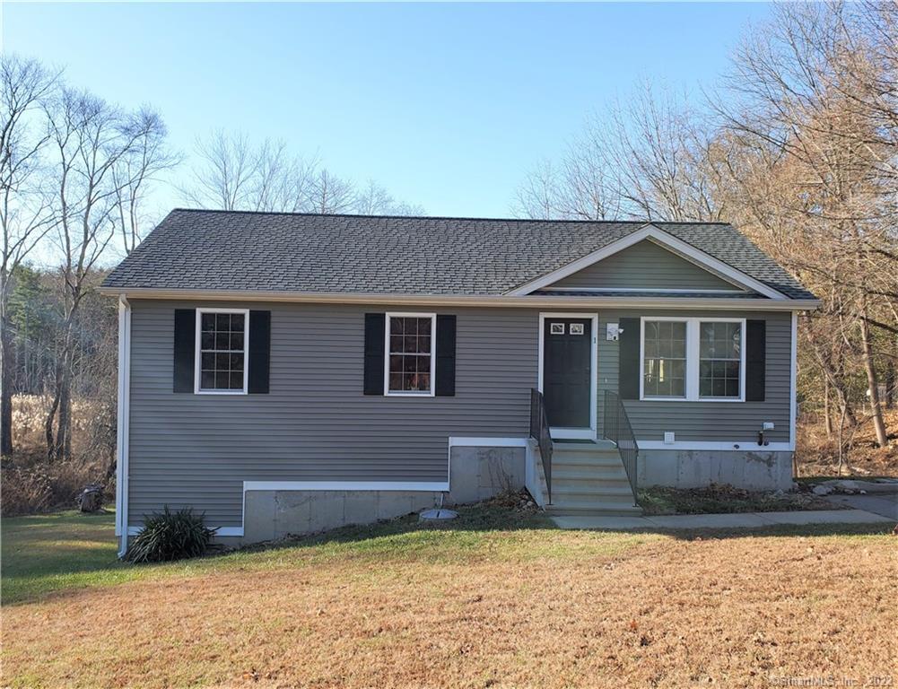 1 Country Club Road Killingly, CT 06241 - Photo 1 of 1 a front view of a house with a yard